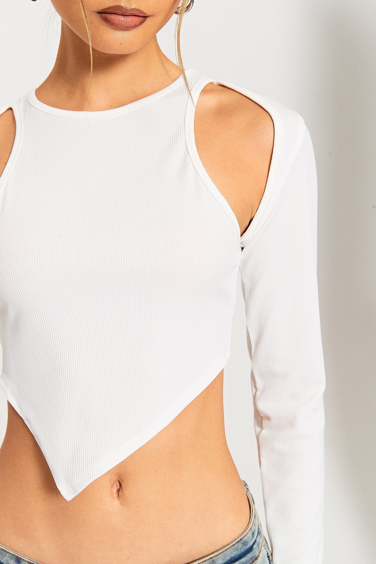 Cut Out Asymmetrical Hem Long Sleeve Top